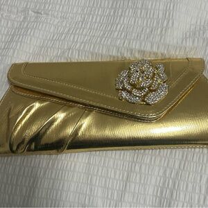 Elegant Gold Clutch with Floral Accent